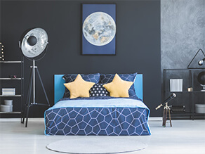 Dark grey universe-themed bedroom